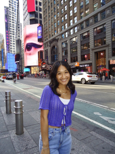 Picture of Naihua Wang on the sidewalk