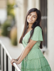 Photo of a woman in a green dress