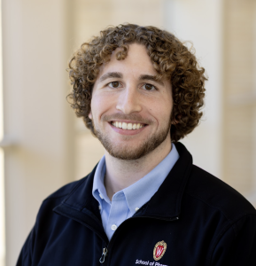 Headshot of a man smiling