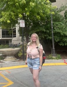 Photo of a woman standing outside