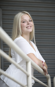 Photo of a woman in a white shirt
