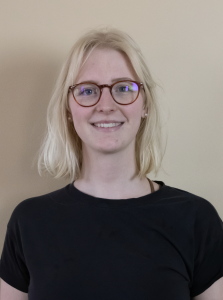 Headshot of a woman in a black shirt