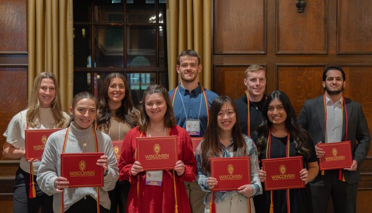 Fall 2023 Leadership Certificate recipients pose and smile as a group.