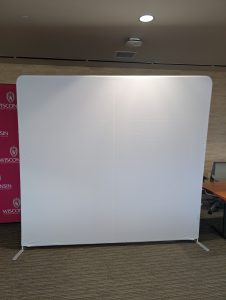 White tension backdrop for pictures.