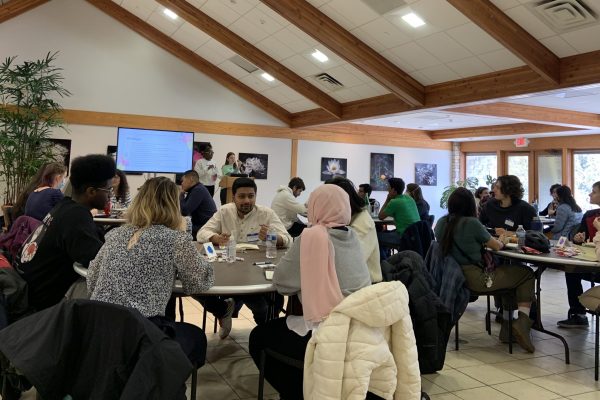 Groups of students participating in workshops.