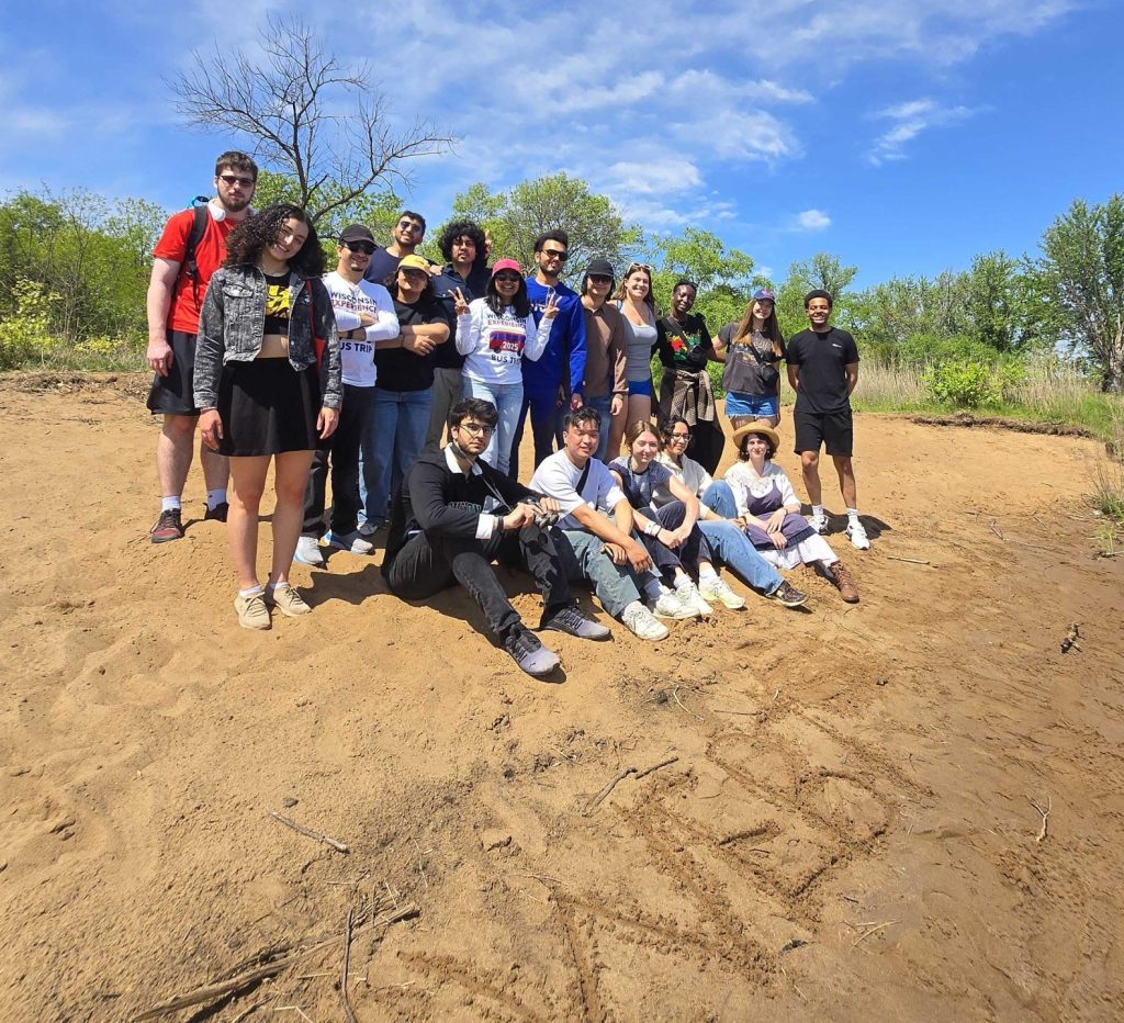 A group of some WEBT students at the sandy banks of the Wisconsin River while visiting the Aldo Leopold Foundation.