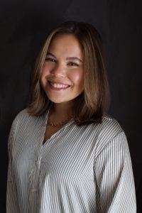 Woman smiling brightly