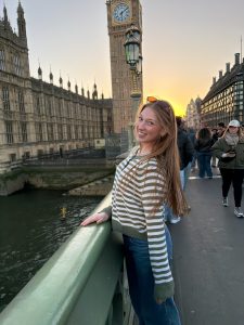 Woman turned to her side smiling