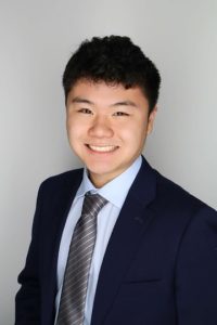 Man smiling brightly