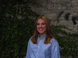Woman smiling in blue top