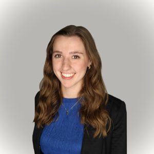 Woman smiling in blue shirt
