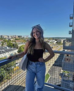 Woman smiling on balcony