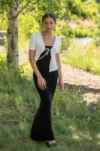 Woman standing in grass